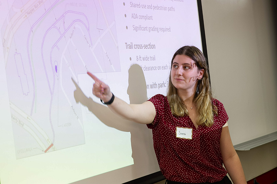 Graduate student presents research